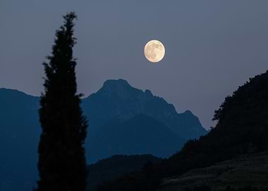 Full Moon Over Mountain Landscape