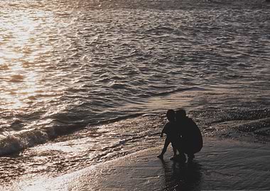 Two figures at the beach
