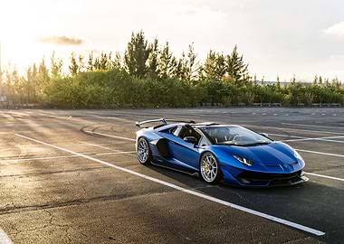 Blue Lamborghini Aventador on Asphalt