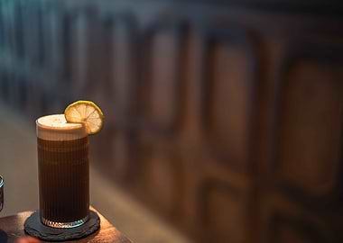 Coffee cocktail with lemon slice