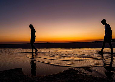 Sunset Beach Walk Silhouettes