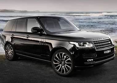 Black Range Rover by the sea