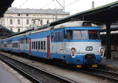 Blue and White Train at Station