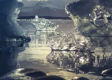Icebergs in Water with Mountain Backdrop