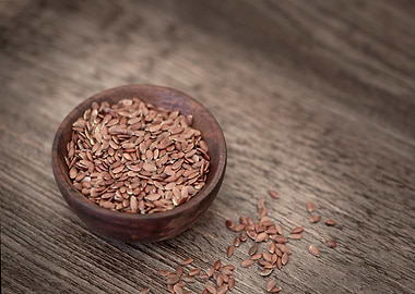 Flax Seeds in Wooden Bowl