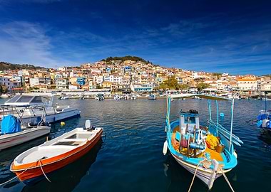 Picturesque harbor with colorful boats and town, Plomari, Lesvos