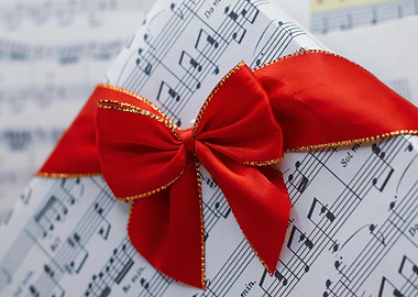Gift wrapped in music sheet paper