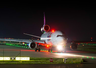 FedEx Airplane on Runway at Night