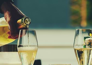 Pouring Champagne into Glass