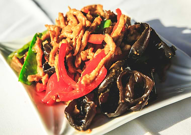 Moo Shu Pork Dish on White Plate