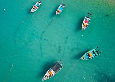 Aerial view of boats in turquoise water