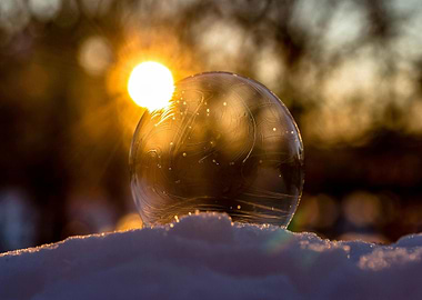 Frozen Bubble in Snow at Sunset
