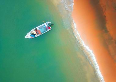 Aerial view of boat near shore