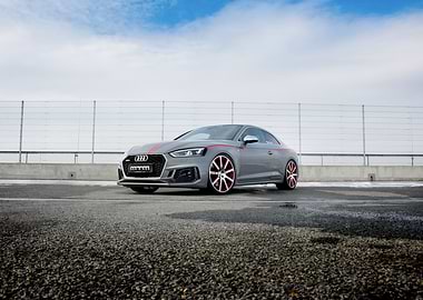 Gray Audi RS5 Coupe with Red Accents