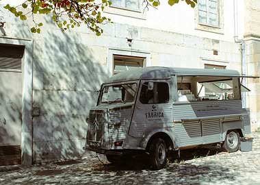 Vintage Food Truck by Stone Building