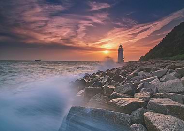 Lighthouse at Sunset with Crashing Waves