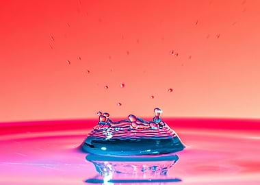 Water Drop Collision in Pink and Blue