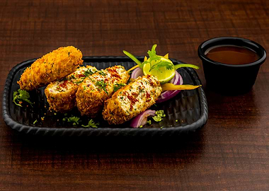 Delicious Chicken Cutlets on Black Plate