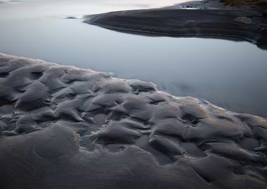 Textured Sand and Water Landscape