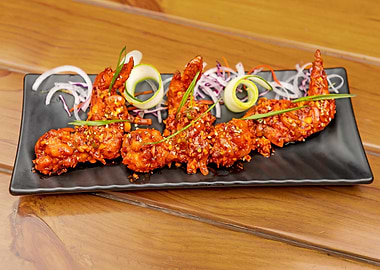 Spicy Chicken Wings on Black Plate