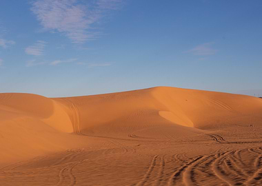 Desert Dunes Under a Blue Sky