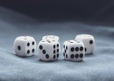 Dice on Blue Fabric