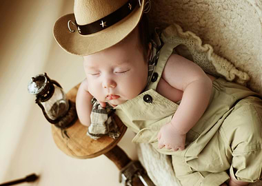 Sleeping Baby Cowboy with Lantern