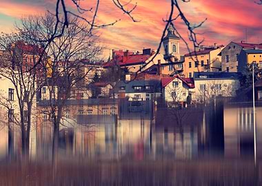European Cityscape at Sunset with Reflection
