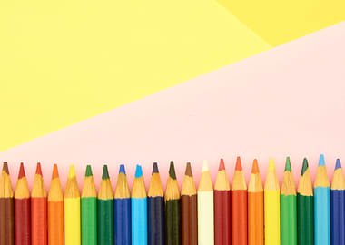Colorful Pencils on Pastel Background