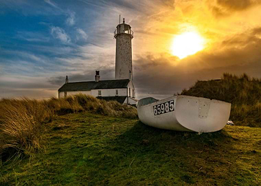 Lighthouse, Boat, and Sunset Landscape