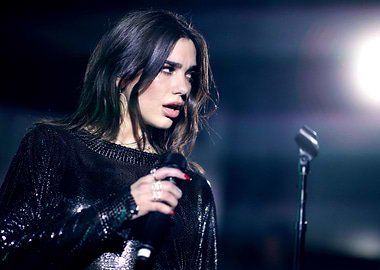Dua Lipa performing on stage