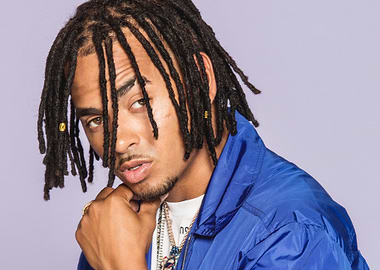 Ozuna Portrait with Dreadlocks and Blue Jacket