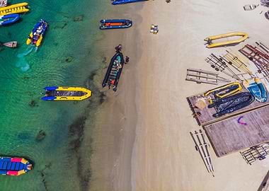 Aerial view of beach with boats