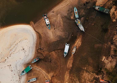 Aerial View of Boats on Mudflats