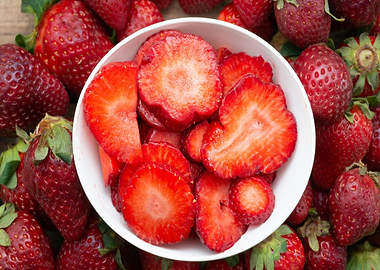 Fresh Strawberries and Slices in Bowl