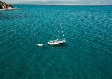 Sailboat on Turquoise Water