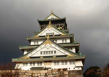 Osaka Castle under a stormy sky