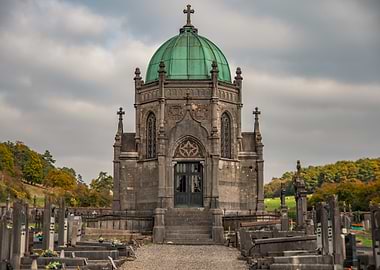Ornate Mausoleum in Cemetery Landscape