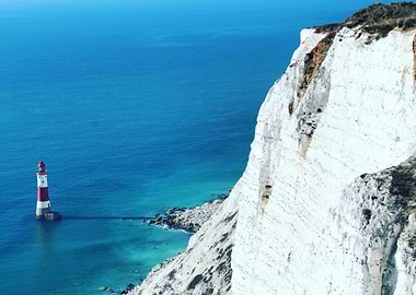 Coastal Lighthouse and White Cliffs