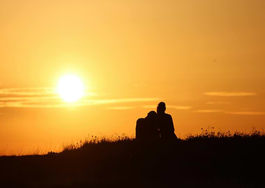 Silhouette of couple at sunset
