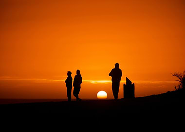Sunset silhouettes of people