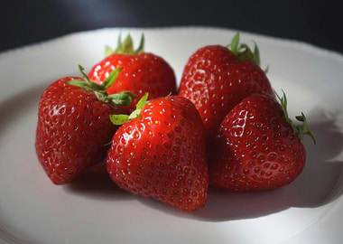Fresh Strawberries on a White Plate