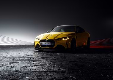 Yellow BMW M4 on dark background