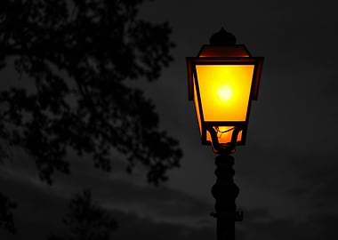 Glowing street lamp at night