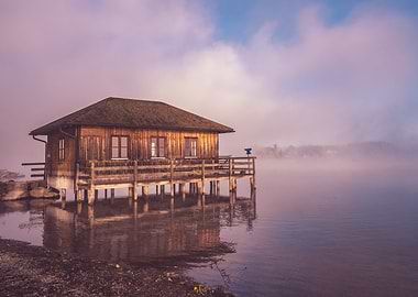 Wooden House on Stilts in Fog