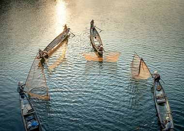 Fishermen on boats with nets