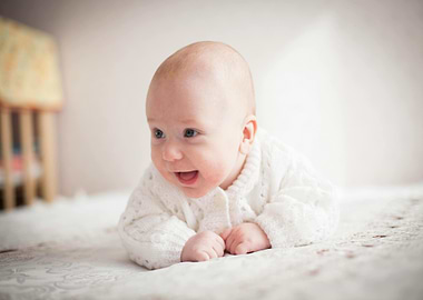 Happy Baby in White Sweater