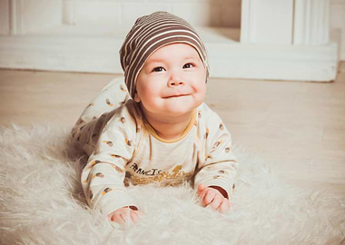 Smiling Baby with Striped Hat