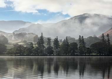 Misty Lake Landscape with Mountain Backdrop