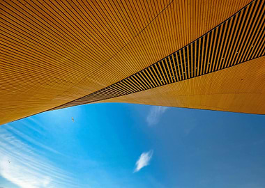 Architectural Wood Structure Against Blue Sky